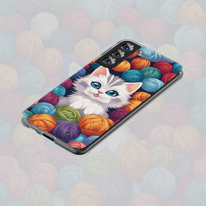 Cute cat art with colorful yarn balls, ideal for cat lovers.