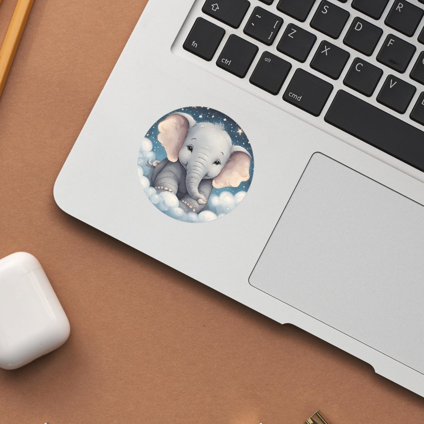 Cute elephant with stars and moon in a whimsical sticker design