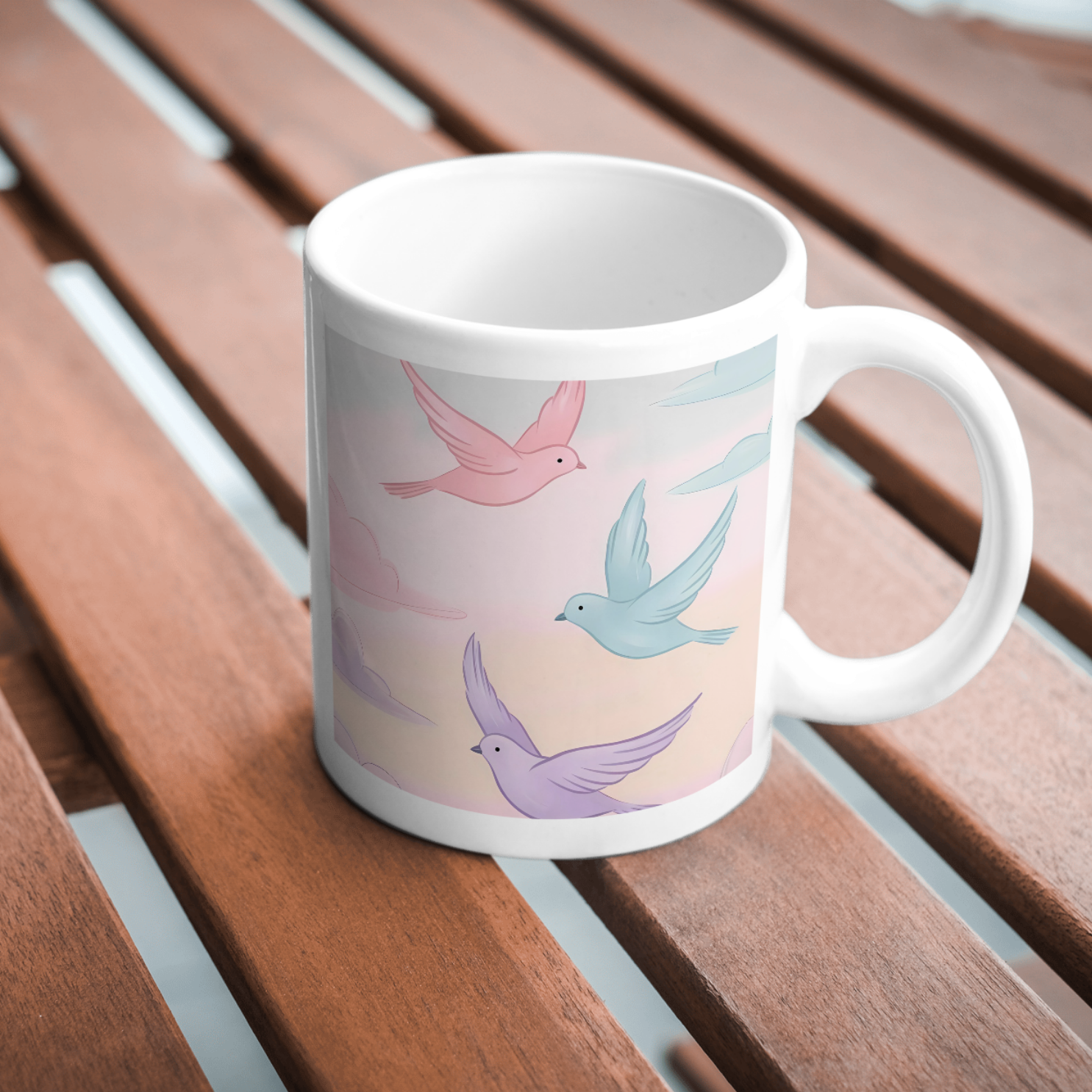 Pastel flying birds in the sky artwork on a ceramic mug, symbolizing freedom and joy