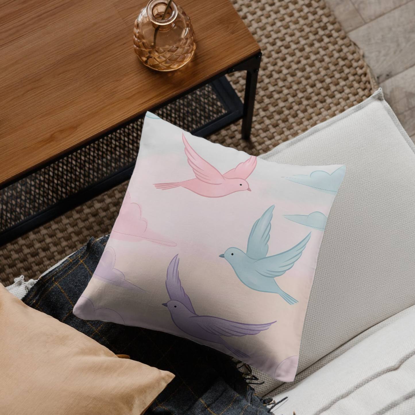 Decorative pillow with pastel flying birds design in a serene sky, offering comfort and tranquility